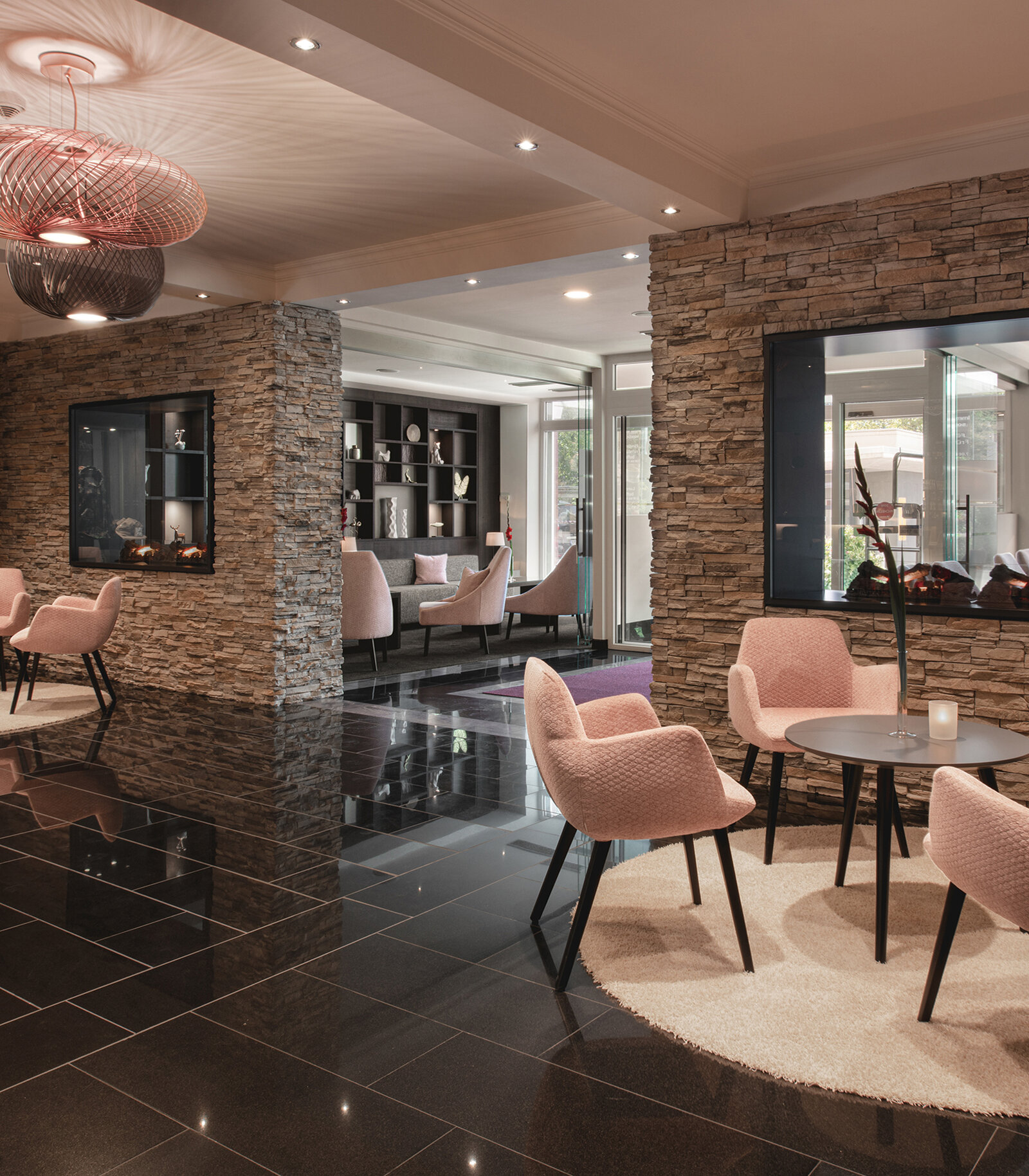 zieflekoch fuerstenhof hotel restaurant lounge sessel tisch steinwand teppich midcentury