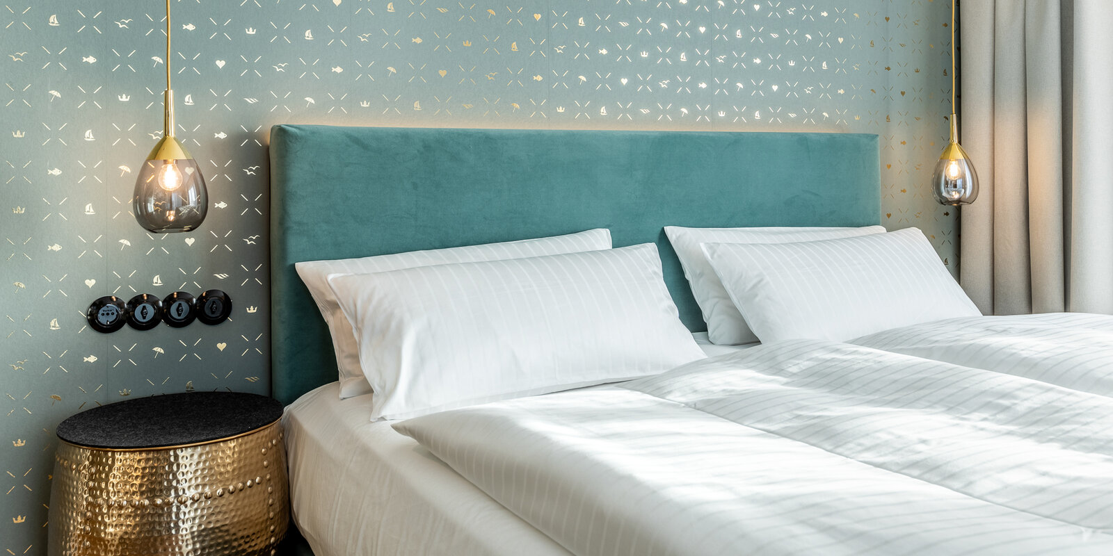 I LOVE SYLT Hotel Terminus Detailansicht Zimmer mit Bett